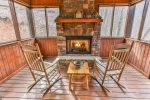 Private screened porch with fireplace